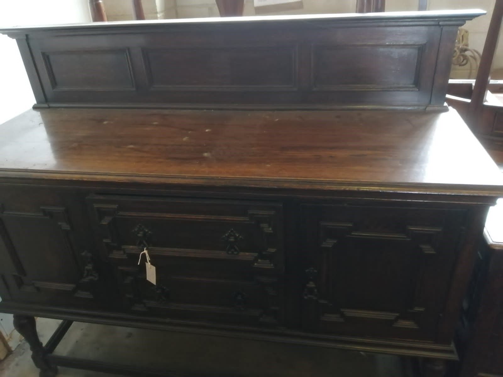 A 1920 Jacobean revival oak sideboard, length 150cm, depth 52cm, height 96cm